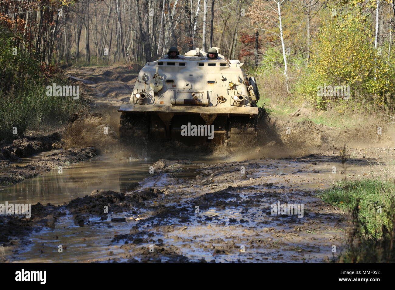 M88A1 Medium-Tracked Recovery Vehicle is an armored recovery vehicle developed for the United States Army to tow and repair disabled tracked vehicles, powered by a Continental AVDS-1790 diesel engine and equipped with a main winch rated at 60,000 pounds. On Oct. 20, 2017, it is driven during the Regional Training Site Maintenance Tracked-Vehicle Recovery Course at Fort McCoy, Wisconsin. The archival image documents hands-on vehicle recovery training on North Post. Stock Photo
