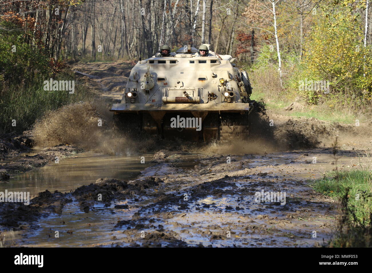 M88A1 Medium-Tracked Recovery Vehicle is an armored recovery vehicle developed for the United States Army to tow and repair disabled tracked vehicles, powered by a Continental AVDS-1790 diesel engine and equipped with a main winch rated at 60,000 pounds. On Oct. 20, 2017, it is driven during the Regional Training Site Maintenance Tracked-Vehicle Recovery Course at Fort McCoy, Wisconsin. The archival image documents hands-on vehicle recovery training on North Post. Stock Photo