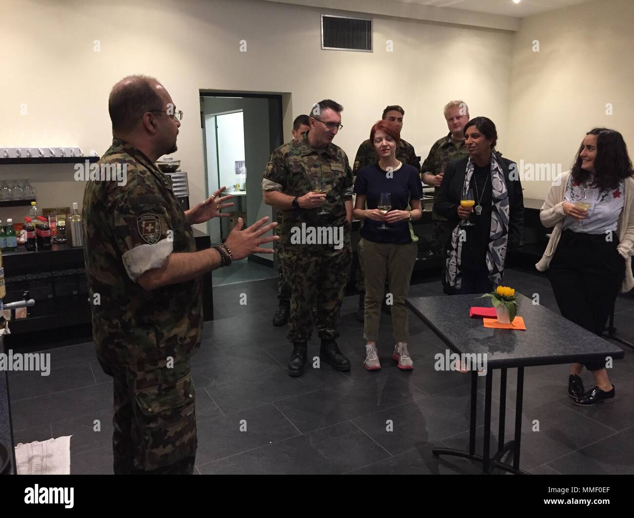Colonel Prasenjit Choudhury of the Swiss Army gives introductory remarks to a group of military and civilian personnel from Organization for Security Cooperation in Europe member states attending the Swiss Ammunition Site Assessment Course in Thun, Switzerland, September 25, 2017. Stock Photo