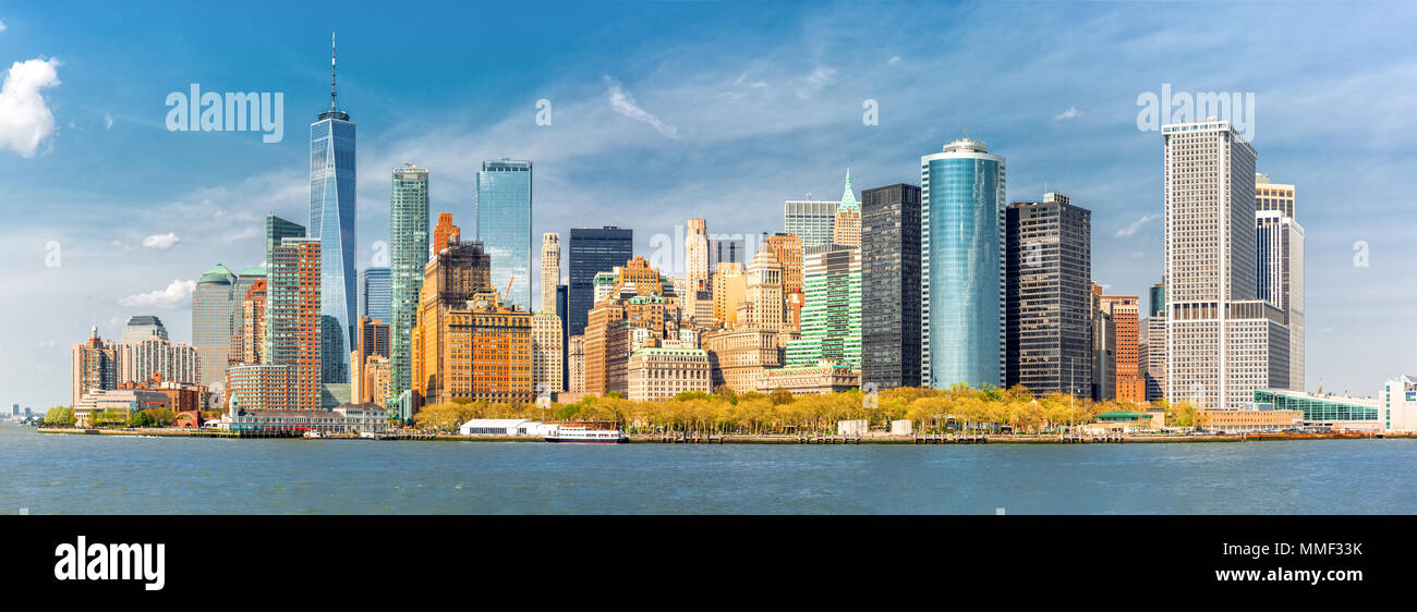 Downtown New York skyline panorama viewed from a boat sailing the Upper Bay Stock Photo