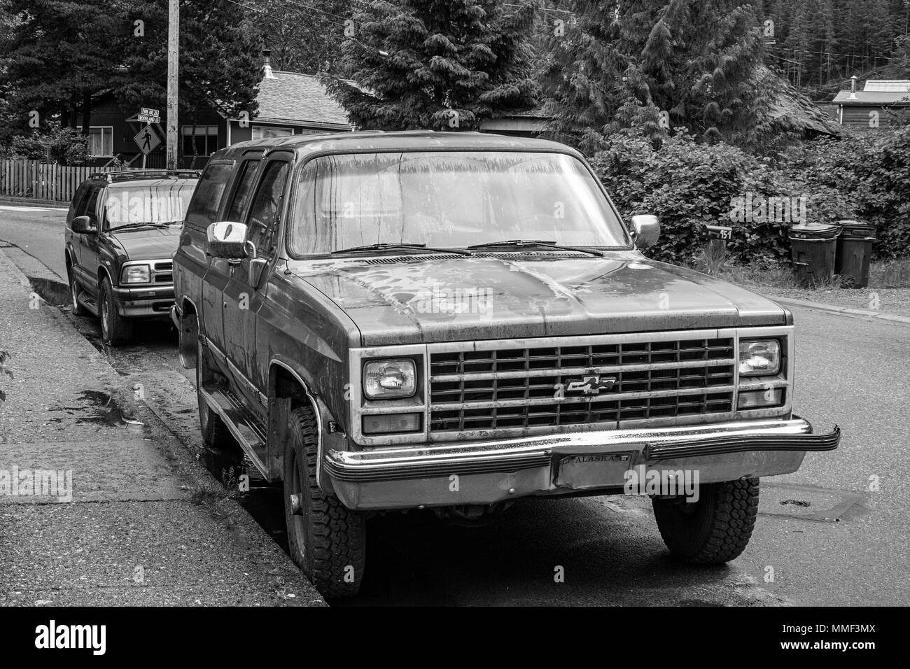 pickup truck rust damaged aged chevrolet Alaska black white Stock Photo