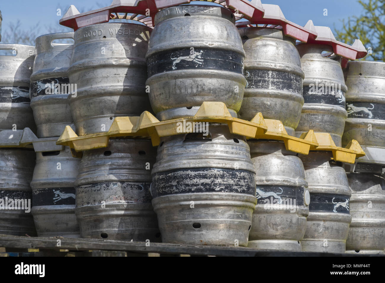 Collection of  aluminium barrels stacked up at Elgood's Brewery, Wisbech, Cambridgeshire UK. A traditional family run brewery making real ales. Stock Photo