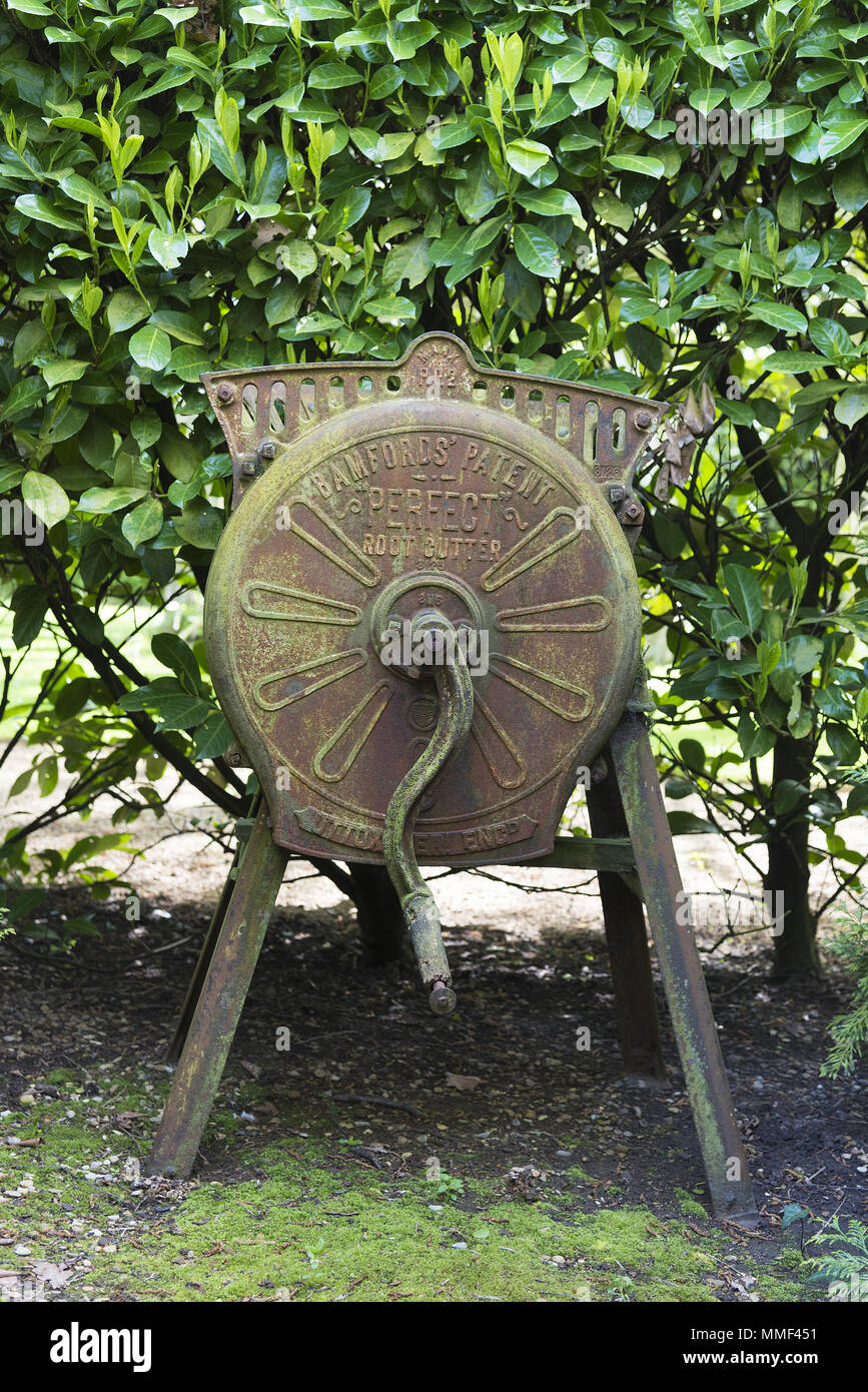 Old fashioned agricultural implement, a root cutter. Stock Photo