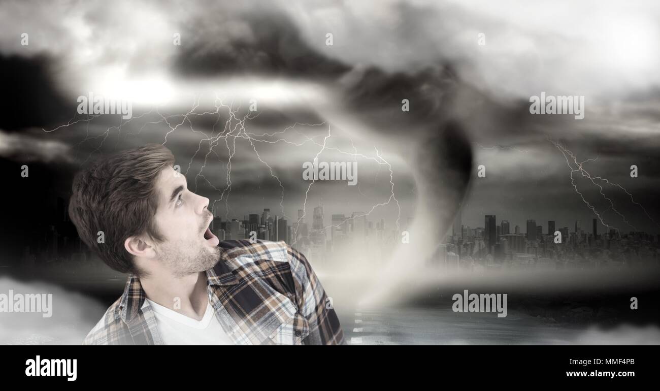 Tornado twister and dark sky with man afraid Stock Photo