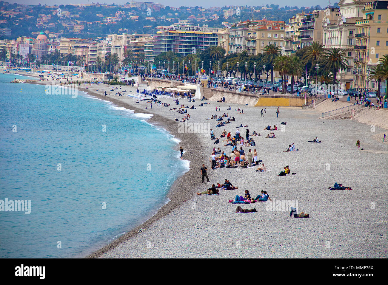 Beach at Promenade des Anglais, Nice, Côte d’Azur, Alpes-Maritimes, South France, France, Europe Stock Photo