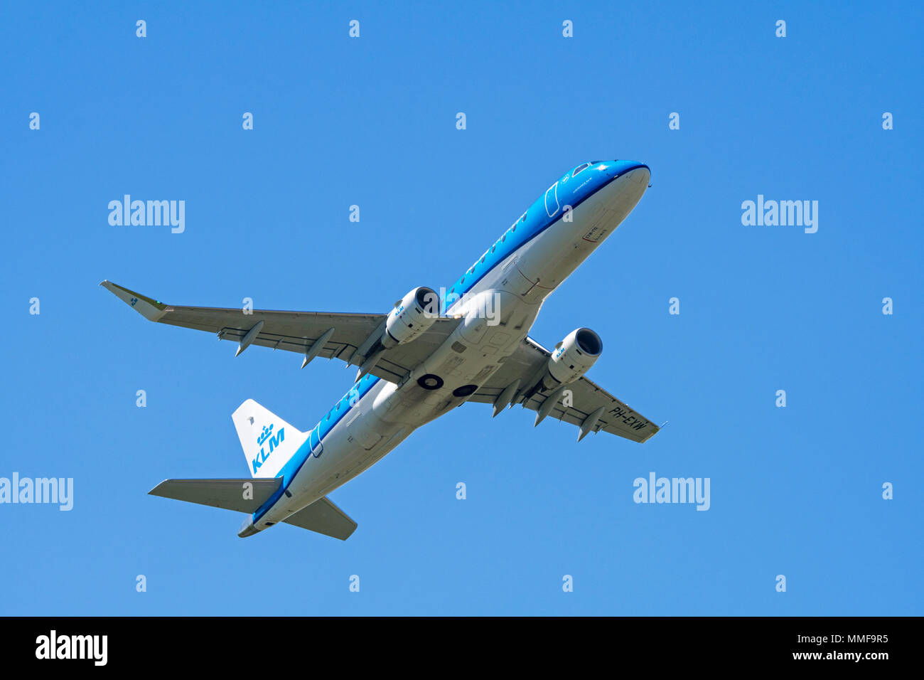 KLM Cityhopper Embraer 175, medium-range twin-engine jet airliner in flight Stock Photo