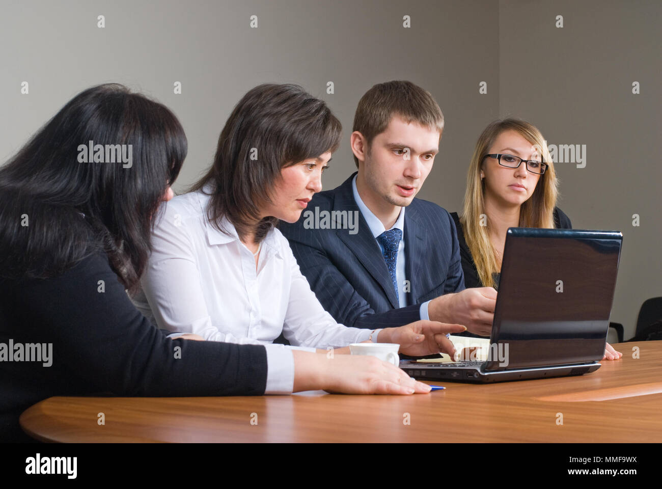 Businessgroup with laptop Stock Photo