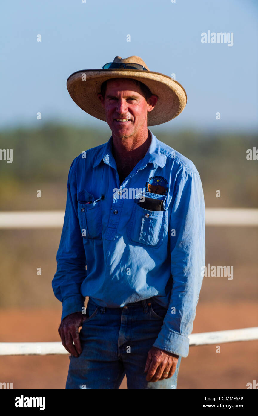 An outback farrier in his Akubra hat at a desert horse racing carnival. Stock Photo
