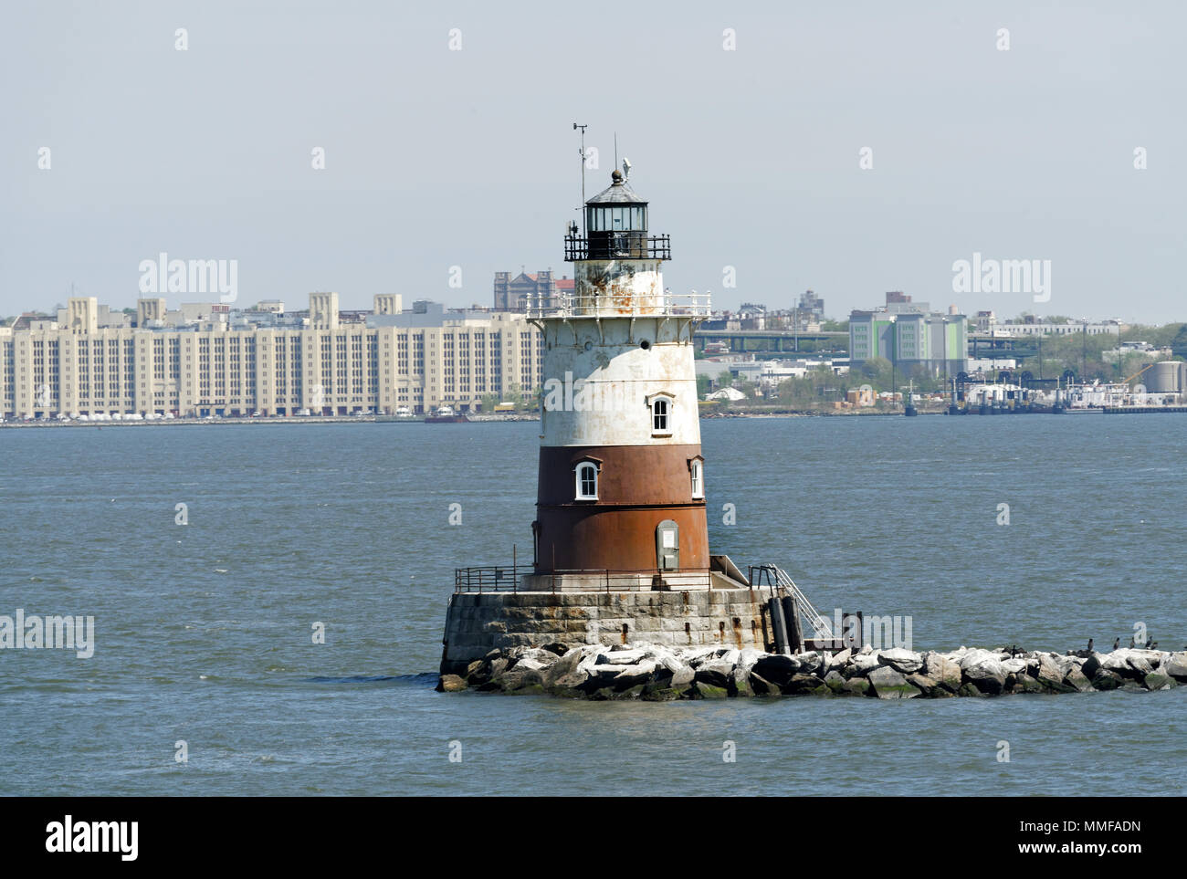 The Robbins Reef Light Station, a sparkplug lighthouse in Upper New York Bay, was built in 1883 and automated in 1966. It is no longer functional. Stock Photo