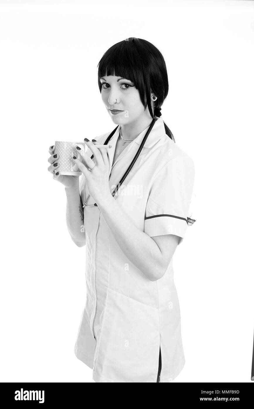 Nurse smoking cigarette Black and White Stock Photos & Images - Alamy