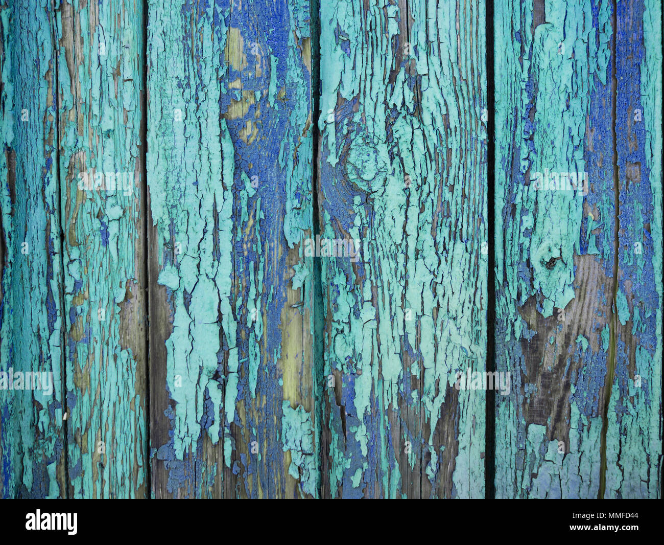 Painted pastel turquoise wood surface, with an abstract expressive ...