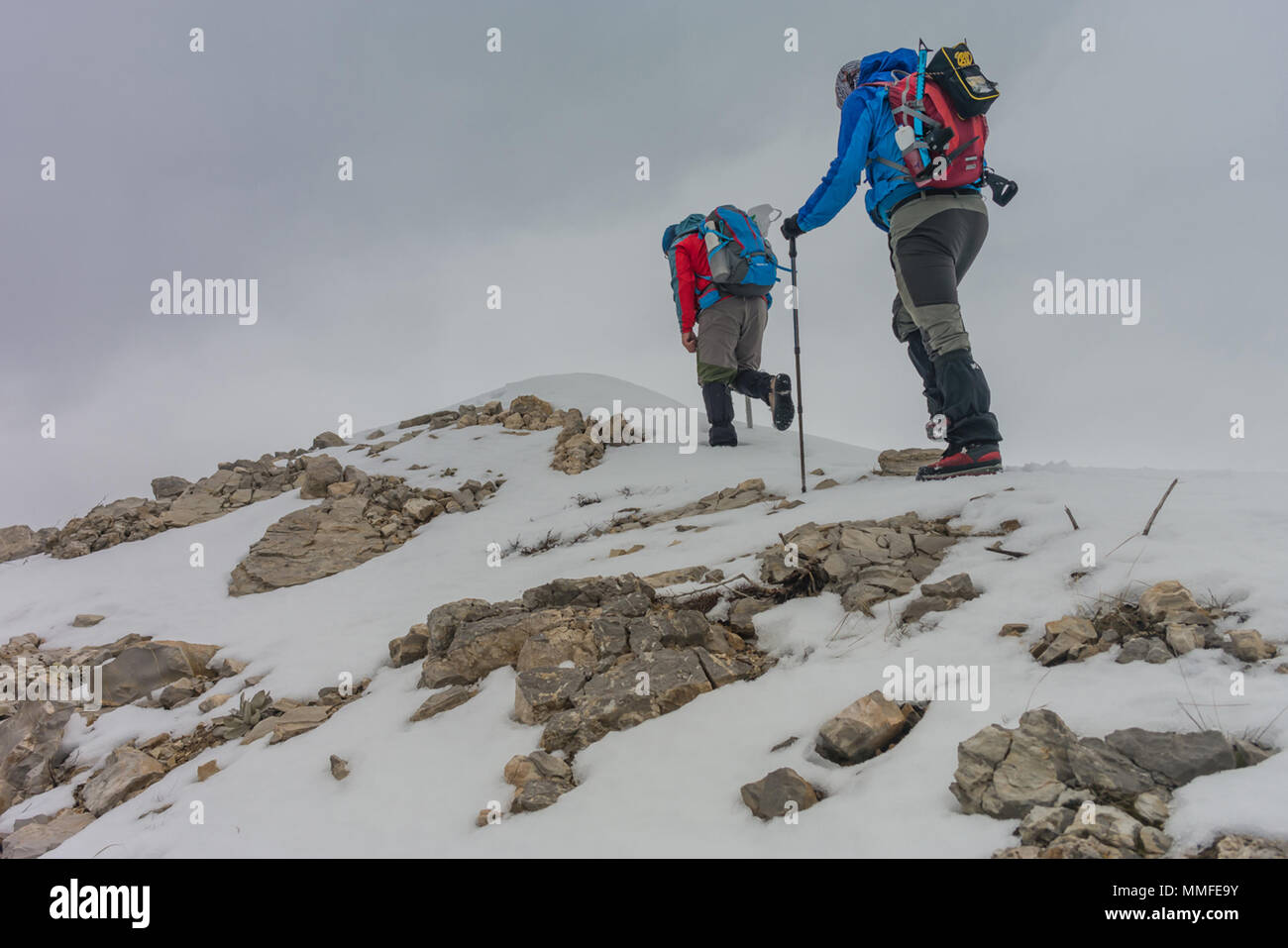 mountaineer climbing to the snow mountain, dagcilar karli dag tirmanisi Stock Photo