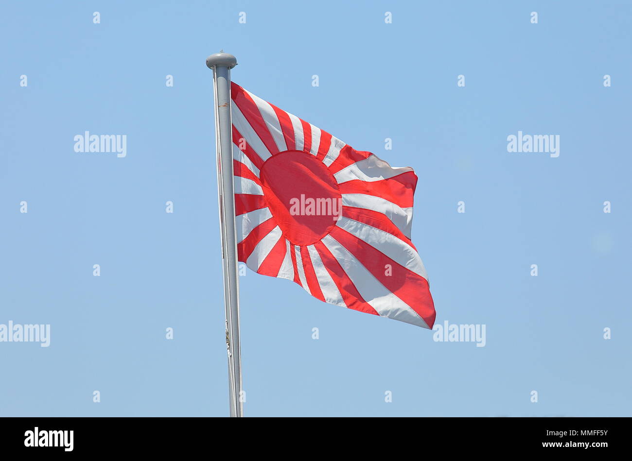 Japanese war flag Kyokujitsuki. Kyokujitsuki was used as an army flag since 1870. Stock Photo