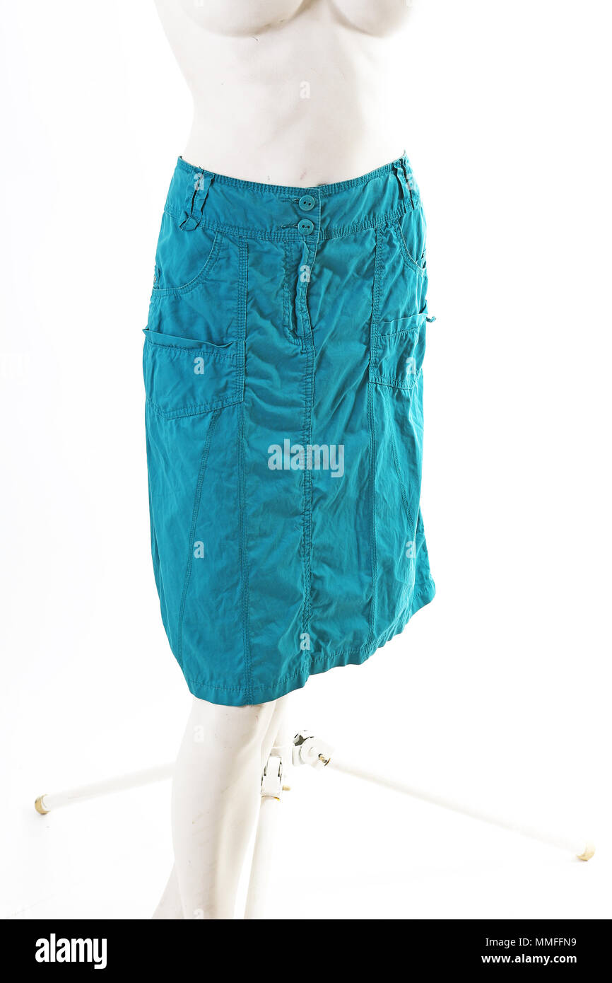 Blue skirt on mannequin full body shop display. Woman fashion styles