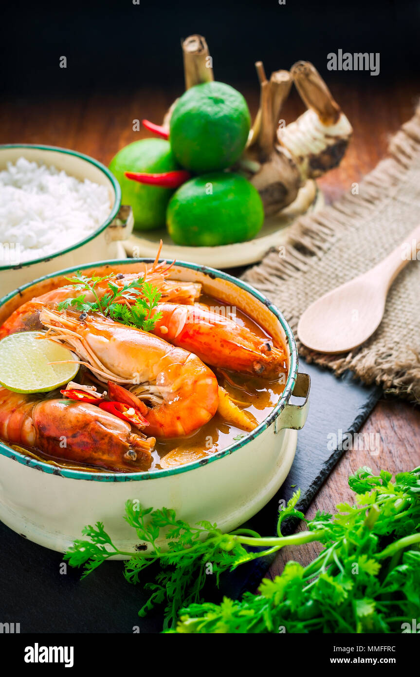 Thai food, River prawn spicy soup or tom yum goong on wooden table Stock  Photo - Alamy