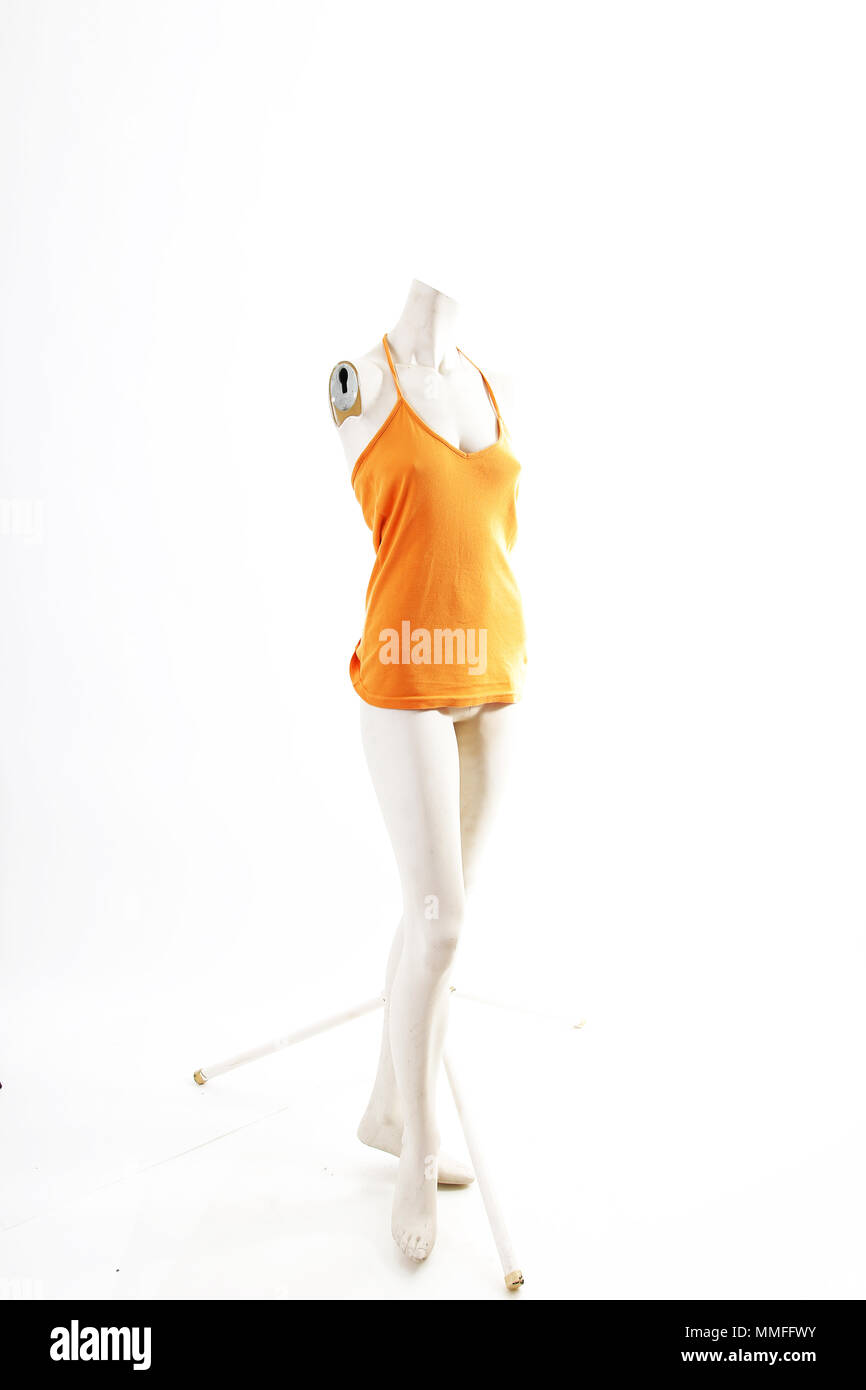 Orange top on mannequin Stock Photo - Alamy
