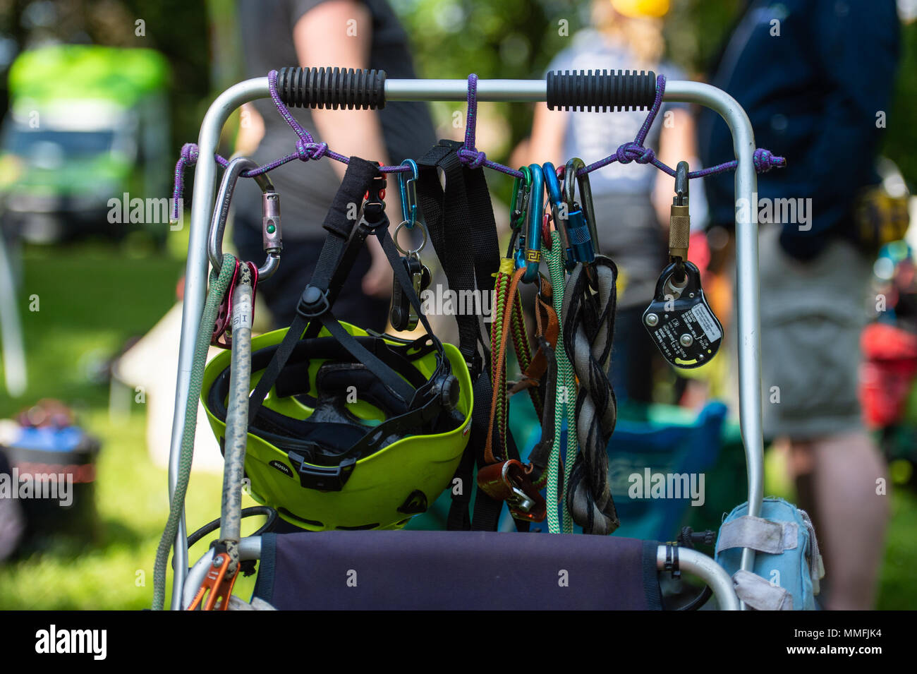 11 May 2018, Germany, Bleckede: Climbing equipment like ropes, helmets and hooks can be seen at the 25th German Tree Climbing Championship. The competition runs until 13 May and features 60 climbers. Tree climbers are needed wherever ladders and platforms can't reach. Photo: Philipp Schulze/dpa Stock Photo