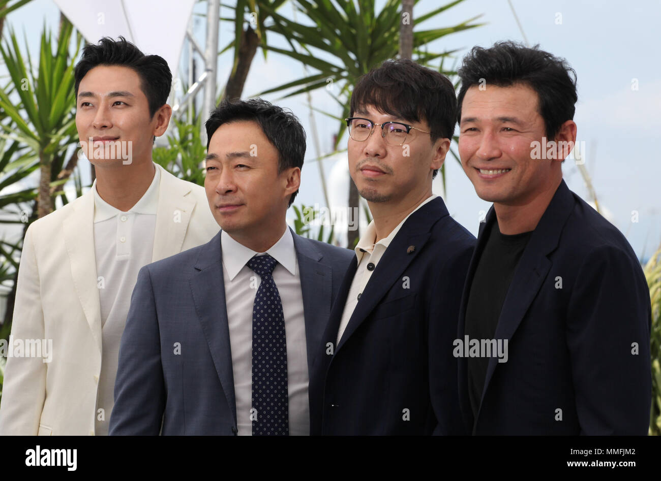 Cannes, France. 11th May 2018. Actors Jung-min Hwang,  Sung-min Lee director Jong-bin Yoon, and actor Ji-Hoon Ju at the Gongjak (The Spy Gone North) film photo call at the 71st Cannes Film Festival, Friday 11th May 2018, Cannes, France. Photo credit: Doreen Kennedy Credit: Doreen Kennedy/Alamy Live News Stock Photo