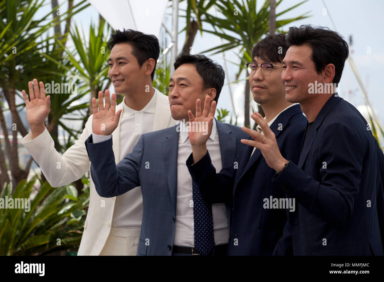 Cannes, France. 11th May 2018. Actors Jung-min Hwang,  Sung-min Lee director Jong-bin Yoon, and actor Ji-Hoon Ju at the Gongjak (The Spy Gone North) film photo call at the 71st Cannes Film Festival, Friday 11th May 2018, Cannes, France. Photo credit: Doreen Kennedy Credit: Doreen Kennedy/Alamy Live News Stock Photo