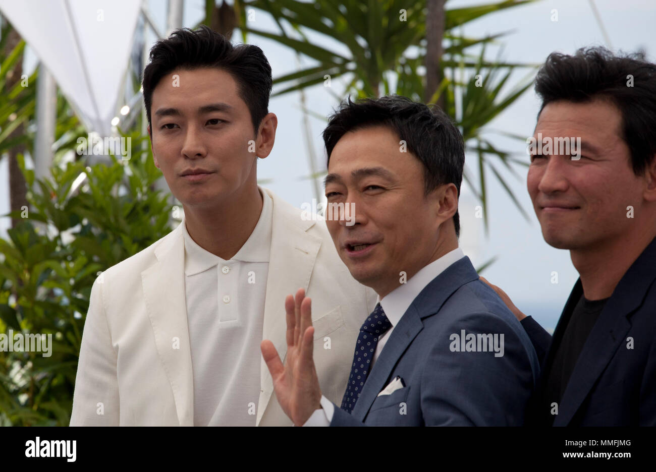 Cannes, France. 11th May 2018. Actors Jung-min Hwang,  Sung-min Lee  and actor Ji-Hoon Ju at the Gongjak (The Spy Gone North) film photo call at the 71st Cannes Film Festival, Friday 11th May 2018, Cannes, France. Photo credit: Doreen Kennedy Credit: Doreen Kennedy/Alamy Live News Stock Photo