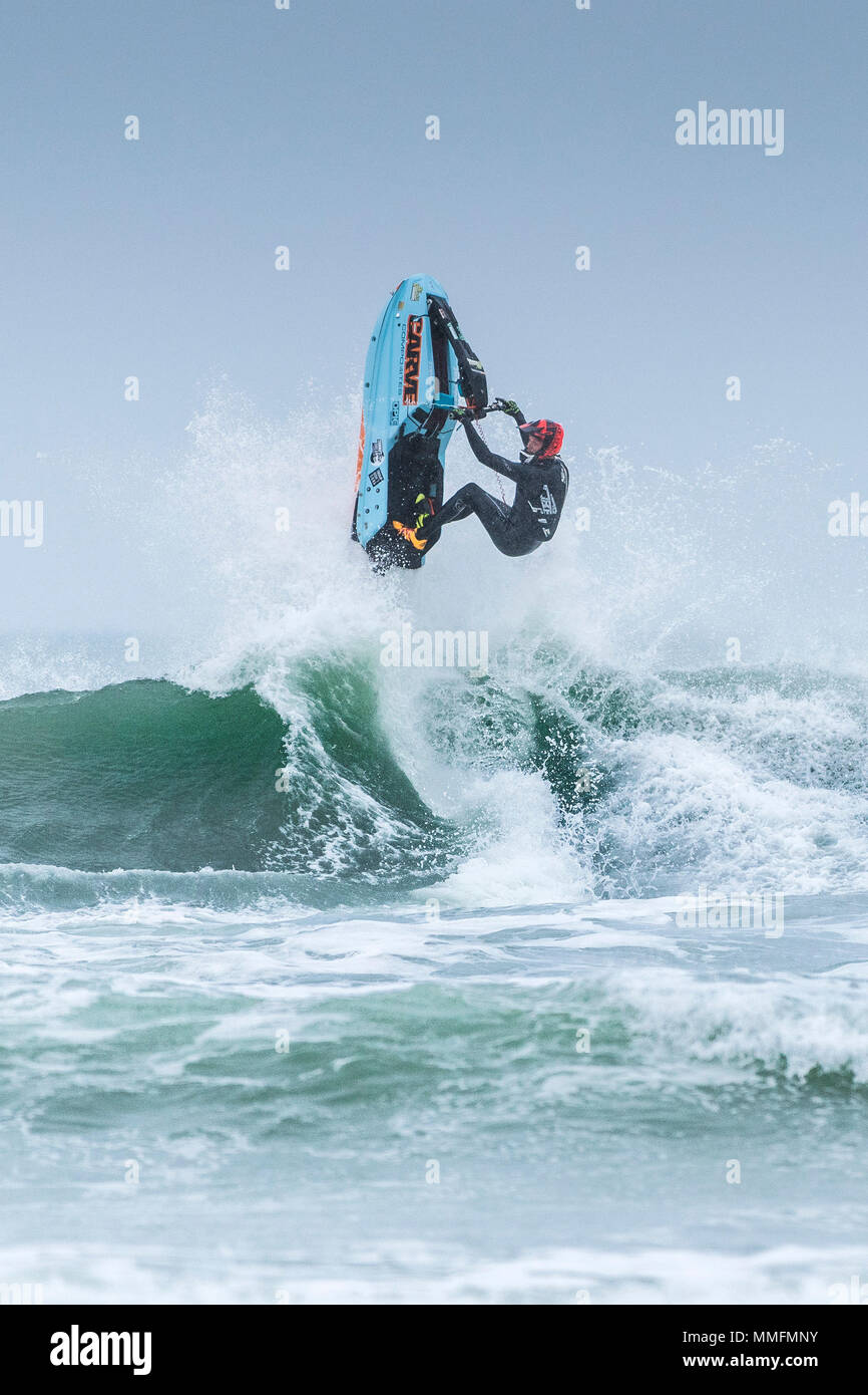 Newquay, Cornwall, UK. 11th May, 2018.  The Freeride World Jetski Championship returns to Fistral beach in Newquay, Cornwall. Strong winds and rough seas on the opening day helped to produce some spectacular aerial action.  Gordon Scammell/Alamy Live News Stock Photo
