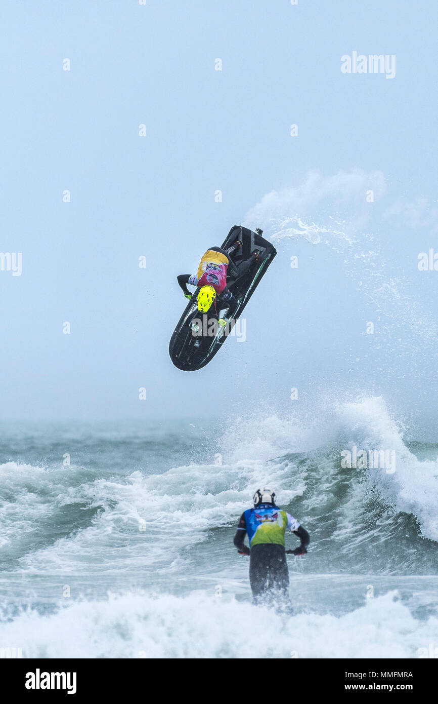 Newquay, Cornwall, UK. 11th May, 2018.  The Freeride World Jetski Championship returns to Fistral beach in Newquay, Cornwall. Strong winds and rough seas helped to produce some spectacular aerial action.  Gordon Scammell/Alamy Live News Stock Photo