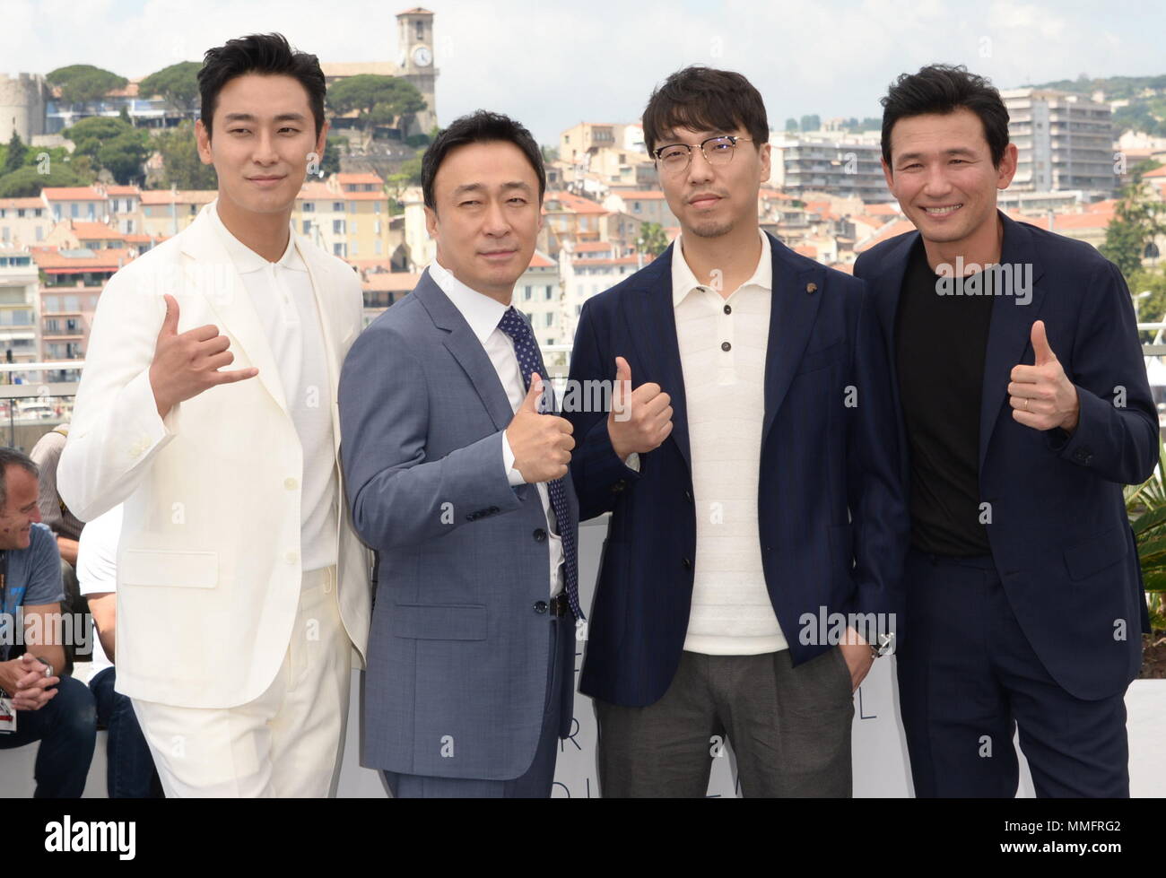 Cannes, France. 11th May, 2018. CANNES, FRANCE - MAY 11: (R-L) Actors Jung-min Hwang, Sung-min Lee and Ji-Hoon Ju attend the photocall for 'The Spy Gone North (Gongjak)' during the 71st annual Cannes Film Festival at Palais des Festivals on May 11, 2018 in Cannes, France. Credit: Frederick Injimbert/ZUMA Wire/Alamy Live News Stock Photo