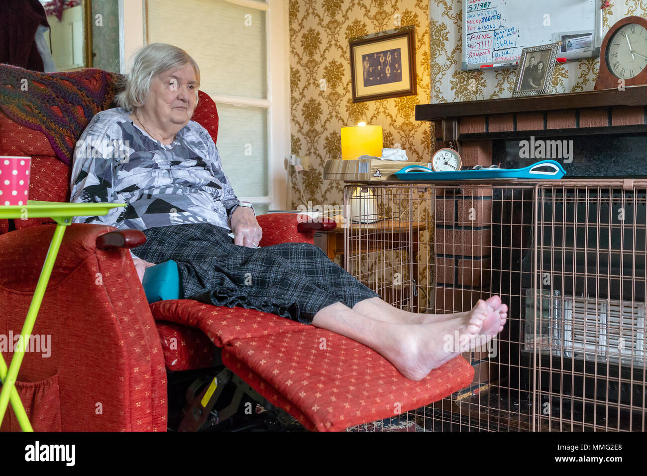 11 May 2018 Old lady suffering from Dementia sits alone with her bare