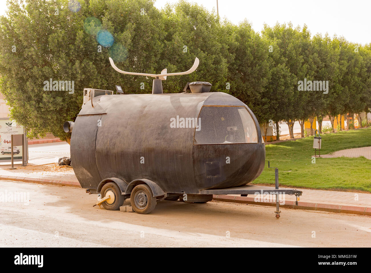 Mobile food kiosk next to a park in Riyadh, Saudi Arabia. Unique helicopter design. Stock Photo