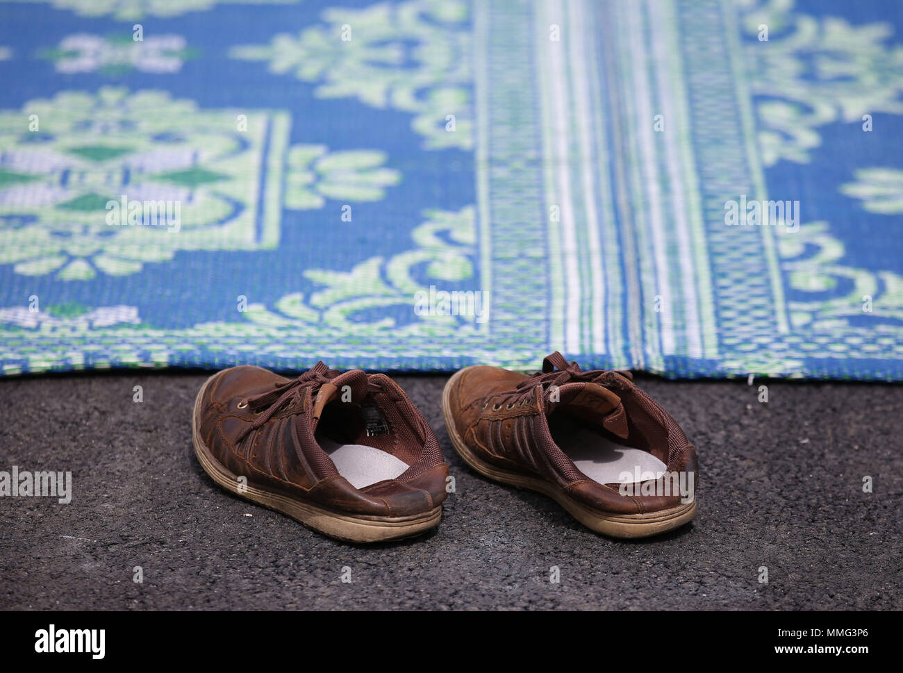 Muslim mosque shoes hi-res stock photography and images - Alamy