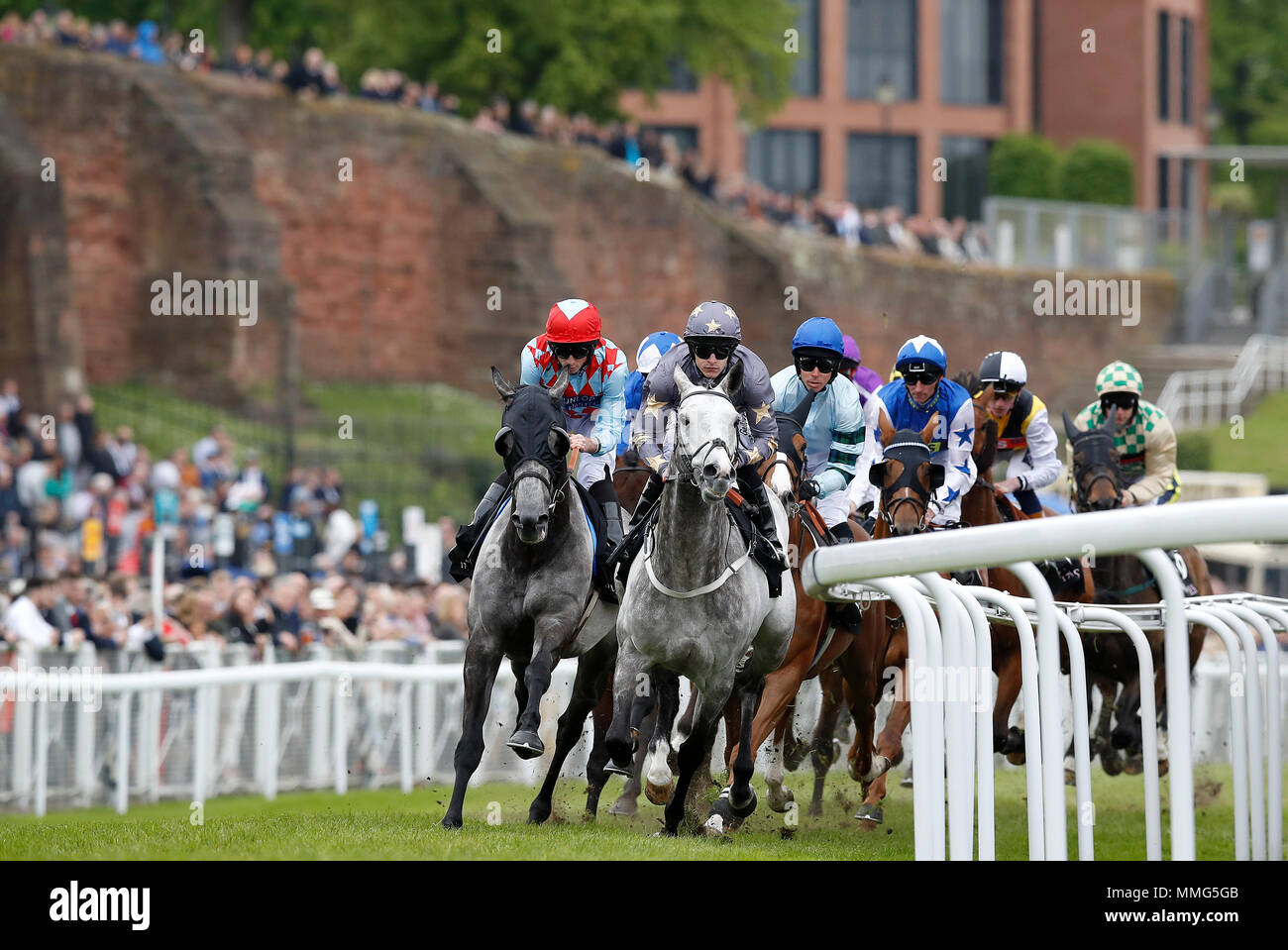 Restorer ridden by Richard Kingscote on their way to winning The Boodles Diamond Handicap Stakes, during 188BET Chester Cup Day of the 2018 Boodles May Festival at Chester Racecourse. Stock Photo