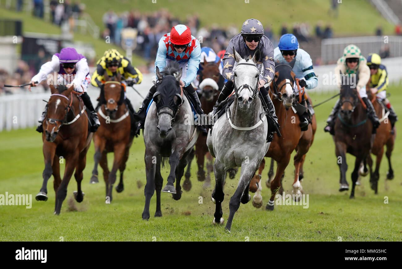 Restorer (centre) ridden by Richard Kingscote wins The Boodles Diamond Handicap Stakes, during 188BET Chester Cup Day of the 2018 Boodles May Festival at Chester Racecourse. Stock Photo