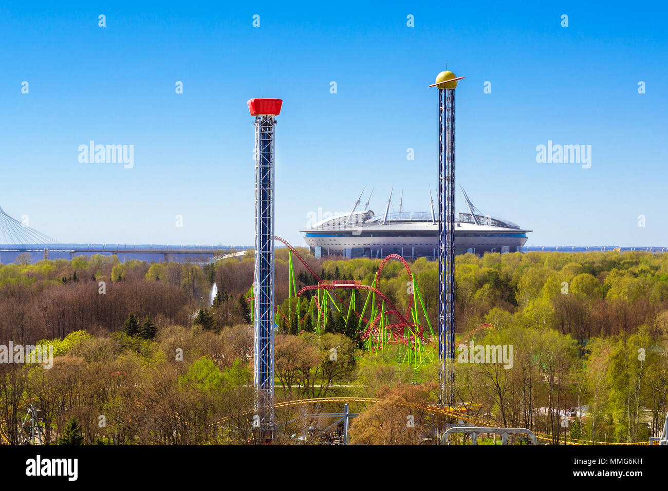 View from height of Ferris wheel to amusement Park, Cable-stayed Bridge and stadium Saint-Petersburg - Zenit Arena football stadium. Seaside Victory P Stock Photo