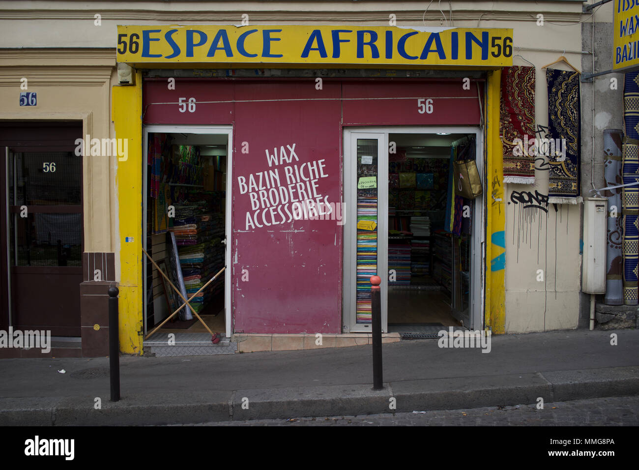 Espace Africain, African fabric shop, rue Polonceau, La Goutte d'Or, 75018 Paris Stock Photo