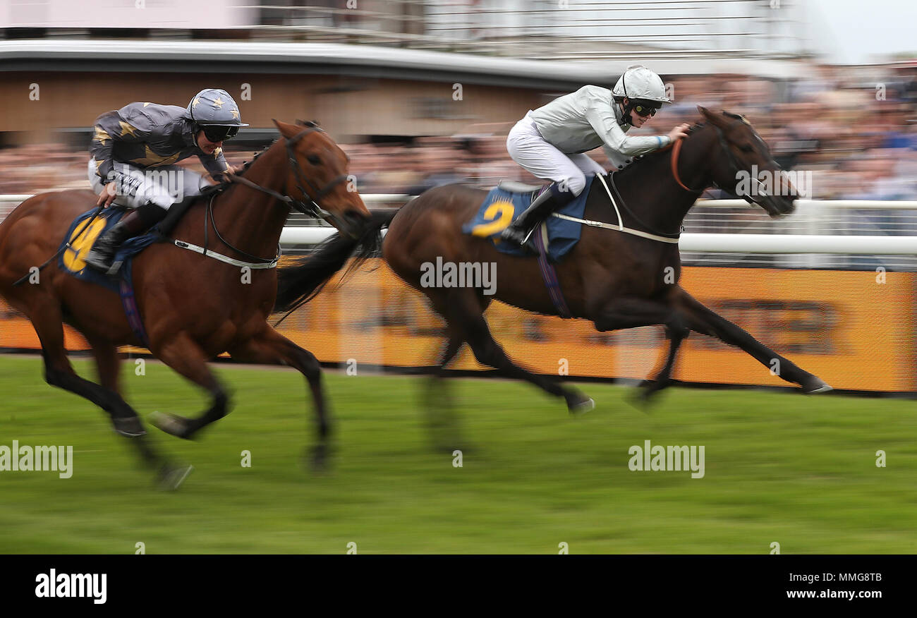 Star of the East (right) ridden by Jane Elliot wins The YCO Apprentice Handicap Stakes from Gabrial's King (left), during 188BET Chester Cup Day of the 2018 Boodles May Festival at Chester Racecourse. Stock Photo