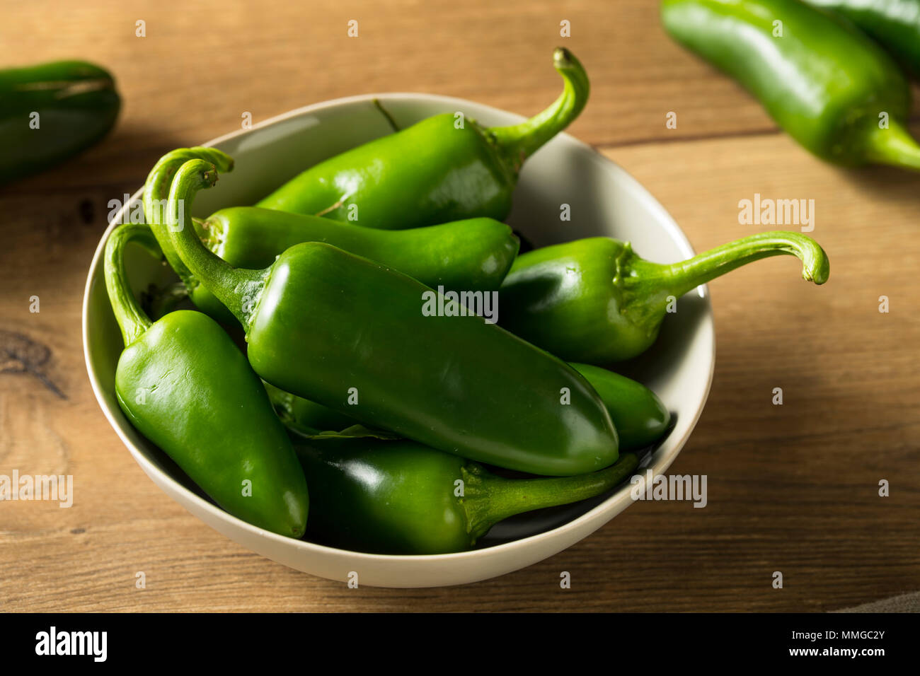 Raw green Organic Jalapeno Peppers Ready to Cook Stock Photo