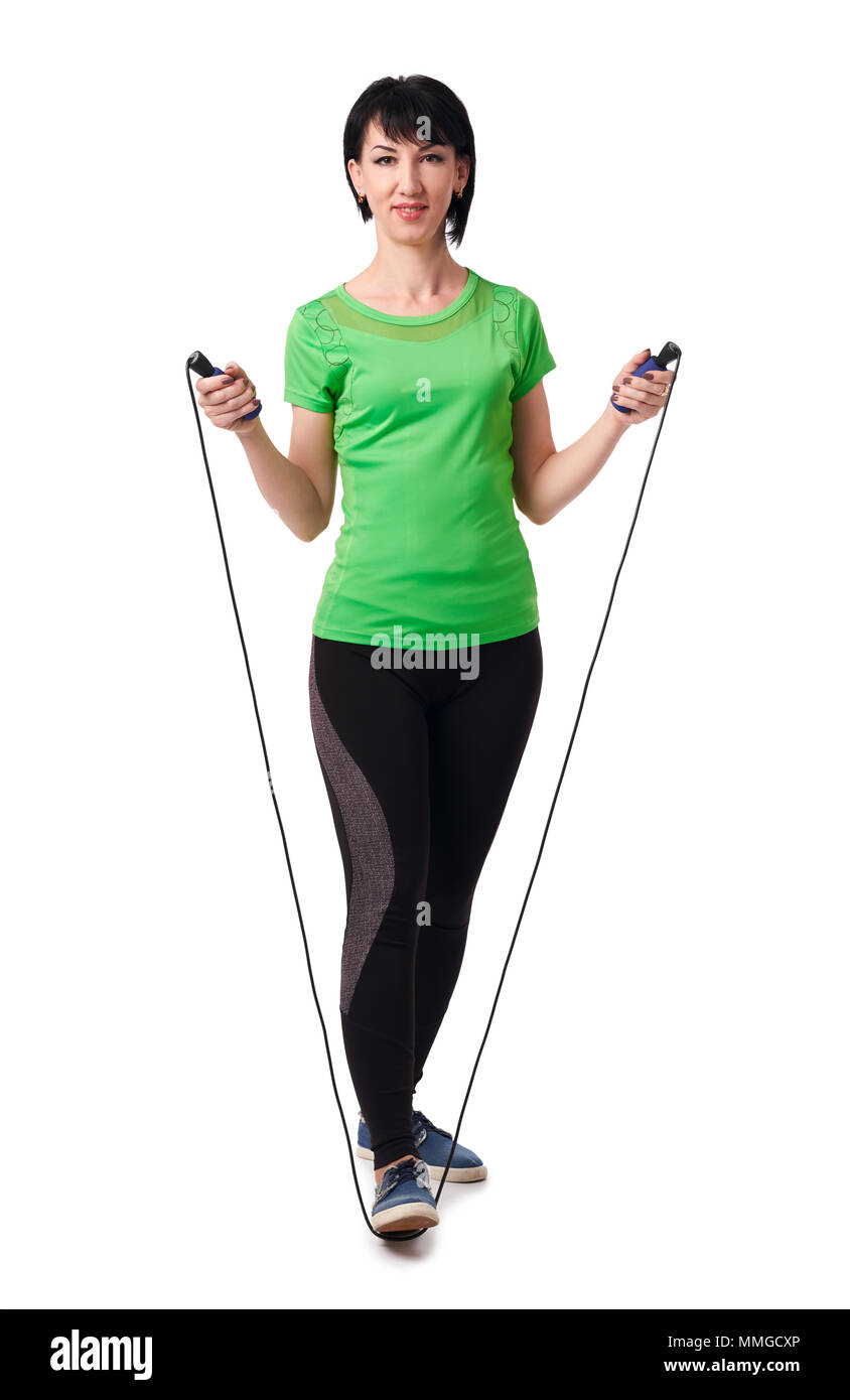 girl posing with skipping rope in studio, isolate on white background ...