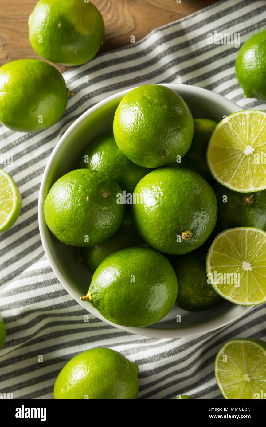 Raw Green Organic Citrus Limes Cut in Half Stock Photo Alamy