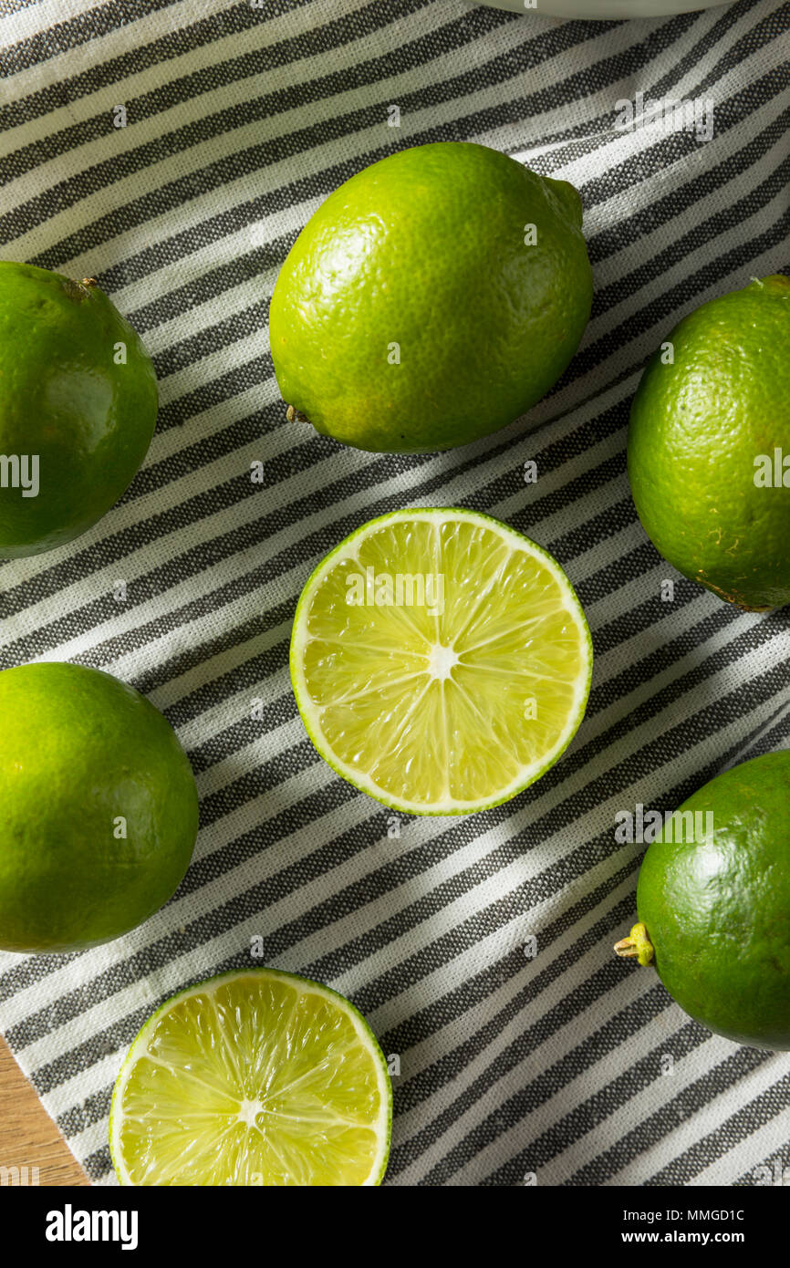Raw Green Organic Citrus Limes Cut in Half Stock Photo Alamy