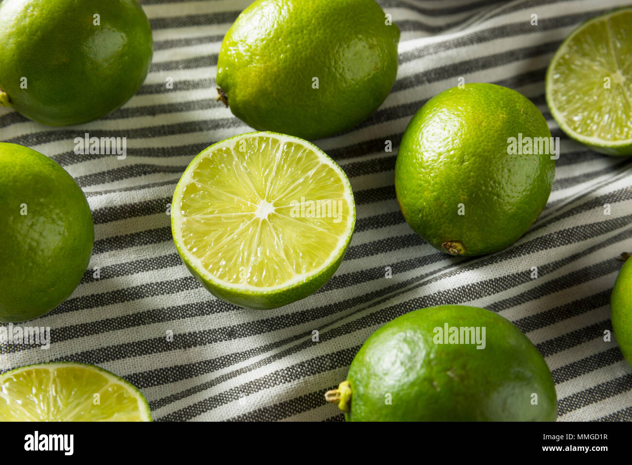 Raw Green Organic Citrus Limes Cut in Half Stock Photo Alamy