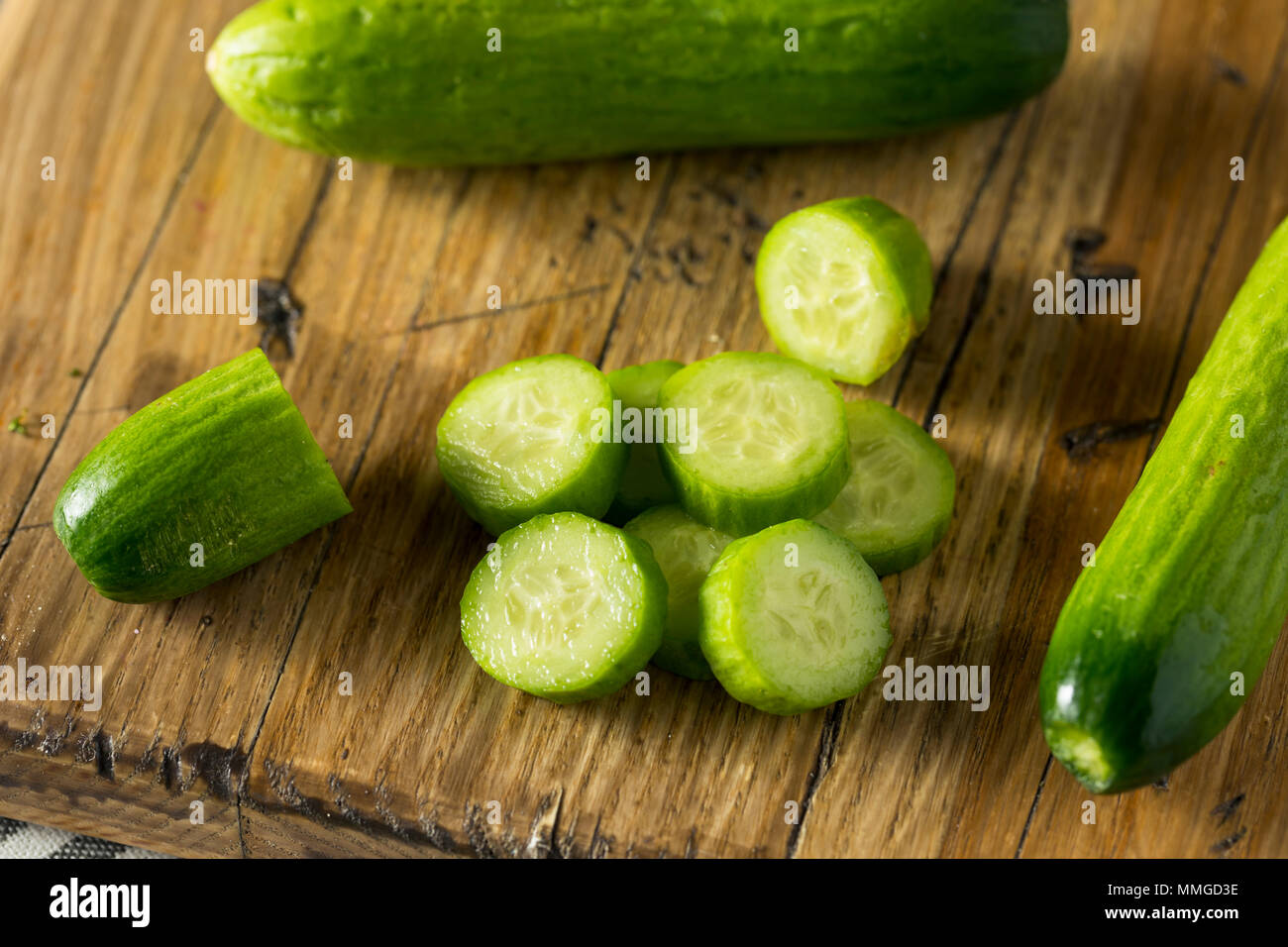 Raw Green Organic Baby Cucumbers Ready to Eat Stock Photo Alamy
