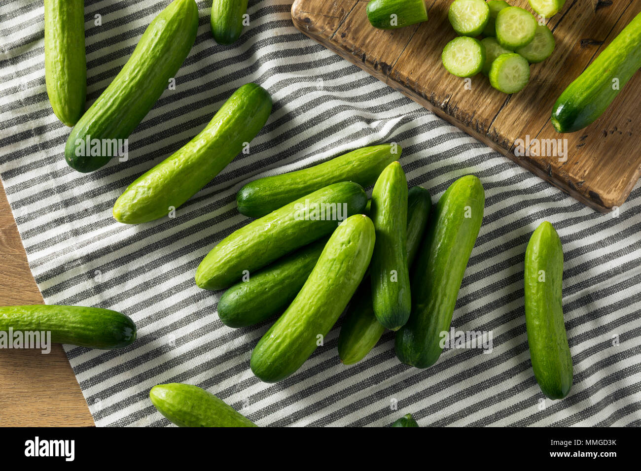 Raw Green Organic Baby Cucumbers Ready to Eat Stock Photo Alamy
