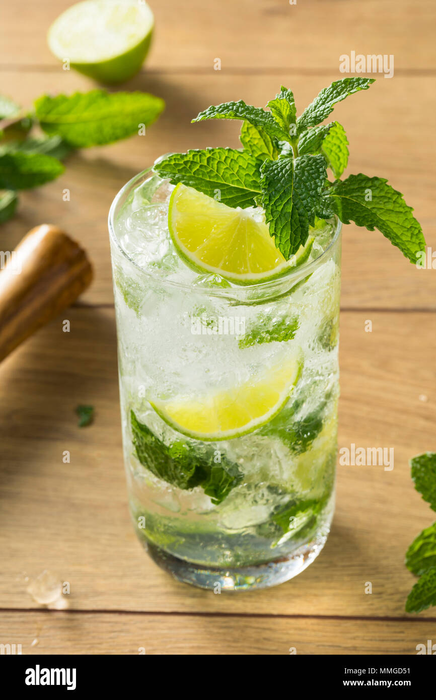 Refreshing Mint and LIme Mojitos with Rum and Soda Water Stock Photo Alamy