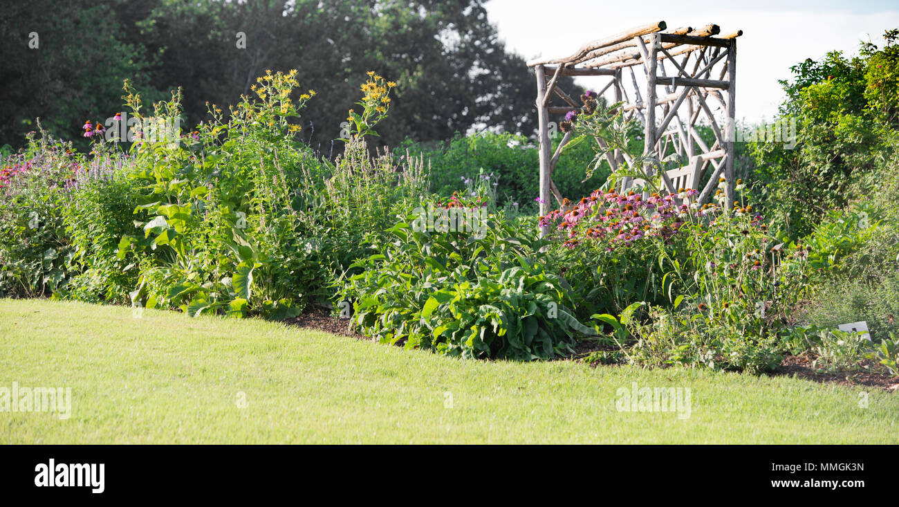 Green and flowered Garden Landscape and garden arbor seating