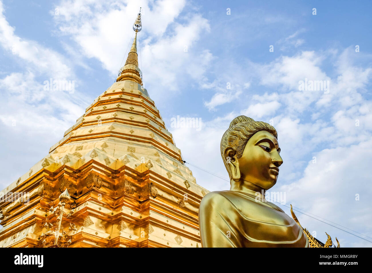 Golden Buddha statue in Wat Phra That Doi Suthep is tourist attraction ...