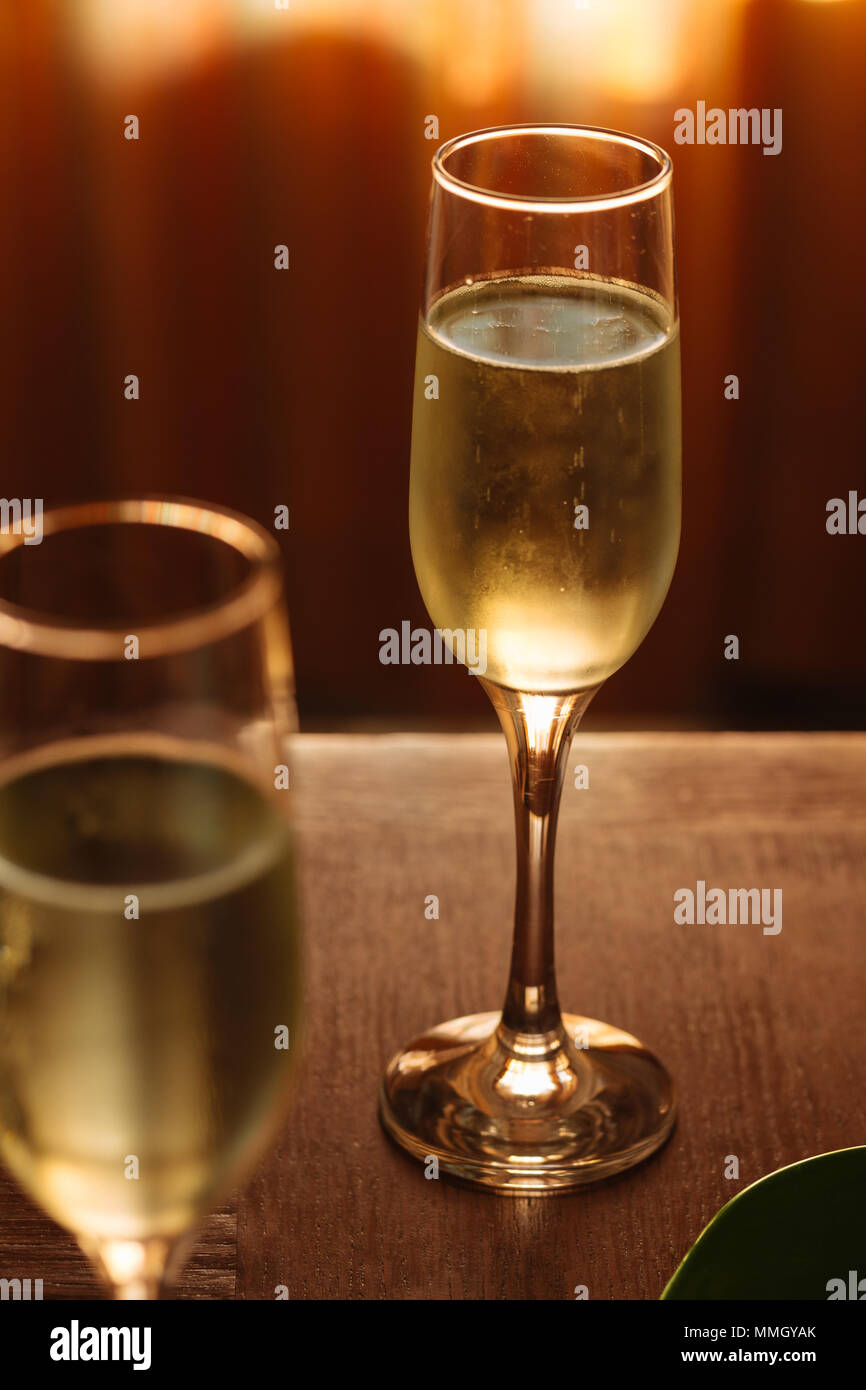 Flutes filled with sparkling prosecco, in a restaurant in Conegliano