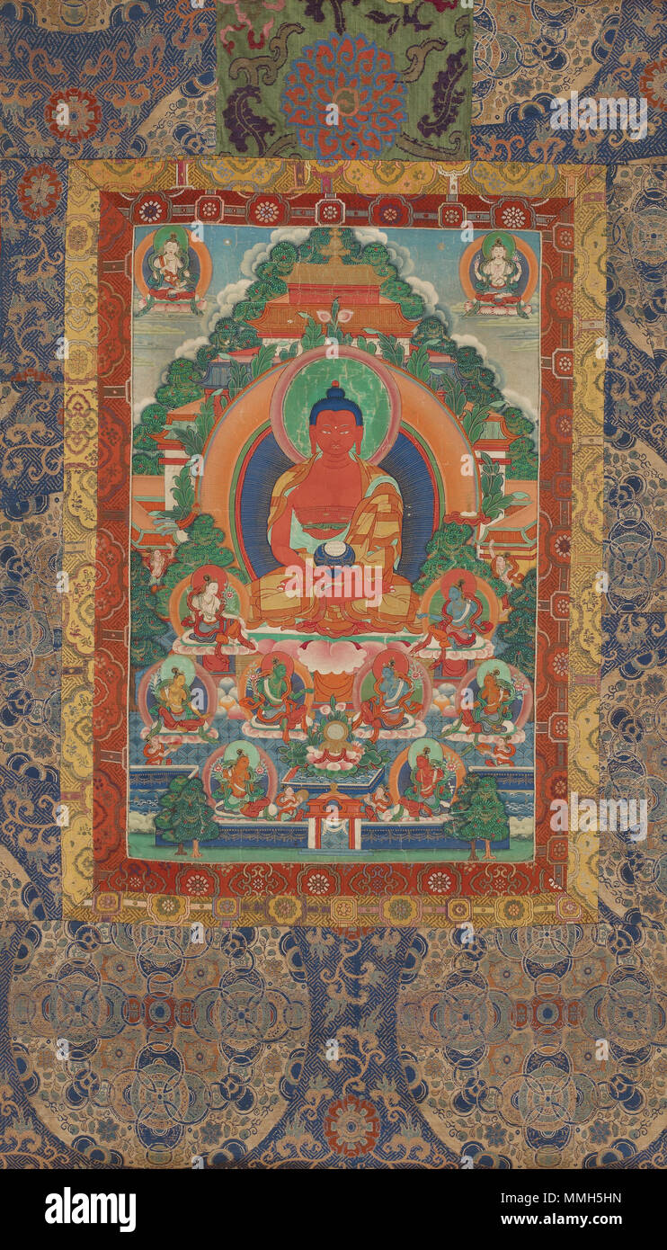 . English: Amitabha in Sukhavati Pure Land, from a four-part set of thangkas. Mineral pigments on sized cotton; Chinese Qing brocade frame, silk dustcover and ribbons; chased silver caps, H x W (overall): 127 x 66 cm (50 x 26 in), H x W (painting): 61 x 38.1 cm (24 x 15 in). Lhasa, Central Tibet, from the Alice S. Kandell Collection. Freer Gallery of Art and Arthur M. Sackler Gallery. Accession Number: S2013.29.2.  . late 19th century. Unknown / Smithsonian Institution Amitabha in Sukhavati Pure Land FS-7620 15 Stock Photo