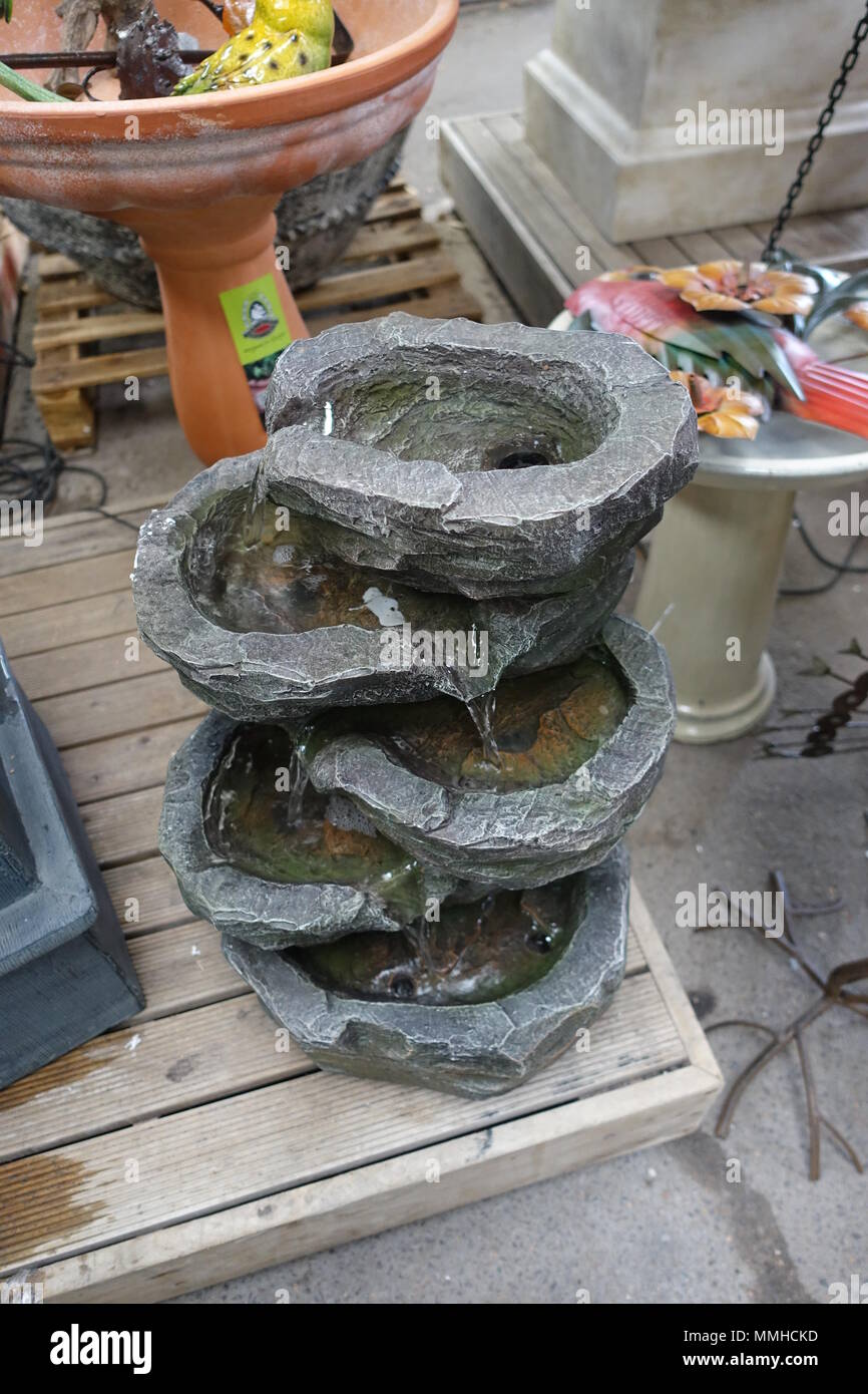 Man made Water fountains for garden decoration Stock Photo