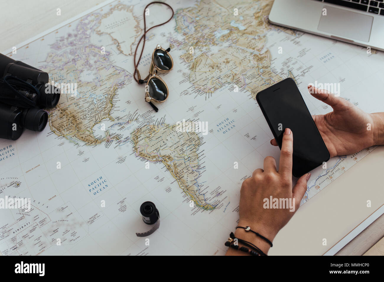 Planning vacation laptop map hi-res stock photography and images - Alamy