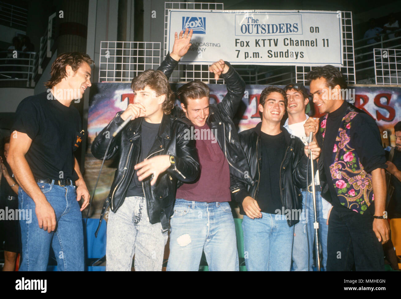 SHERMAN OAKS, CA - MAY 19: Actors Boyd Kestner,  Jay R. Ferguson, David Arquette, Rodney Harvey, David Arquette, Harold Pruett and Robert Rusler attend event for 'The Outsiders' television series at Sherman Oaks Galleria on May 19, 1990 in Sherman Oaks, California. Photo by Barry King/Alamy Stock Photo Stock Photo